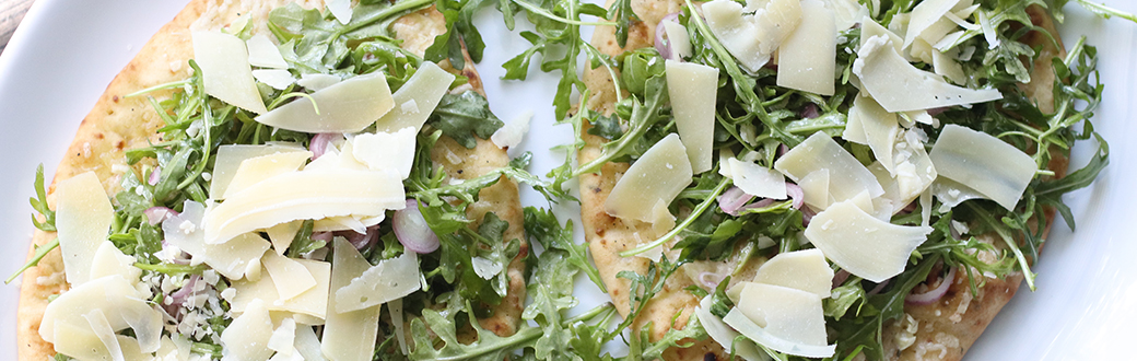 Arugula salad on naan bread