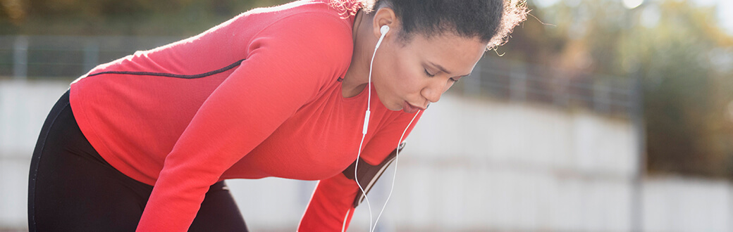 A woman exercising outside