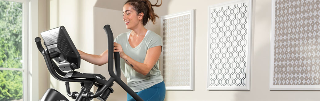 A woman working out on a Max Total 16.