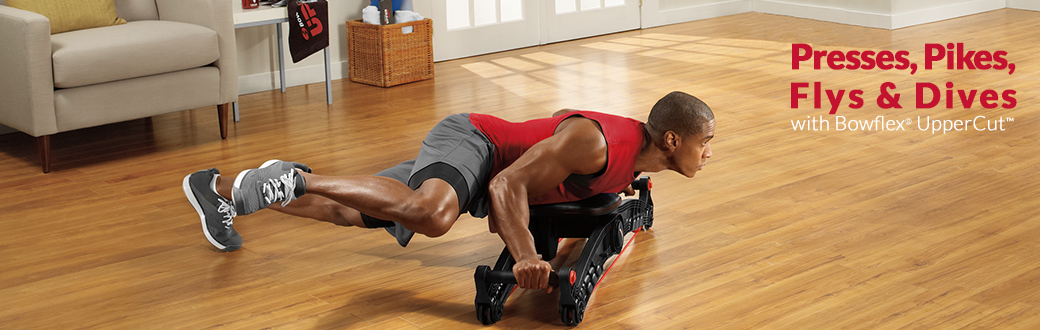 A fit man using a Bowflex Uppercut.