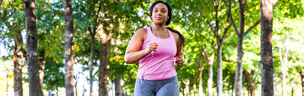 A woman walking fast outside.