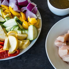 closeup image of chicken veggie kabobs