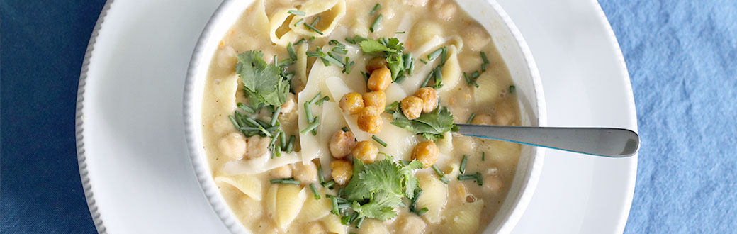 Chickpea noodle soup in a bowl.