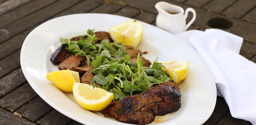 flank steak with arugula and lemon