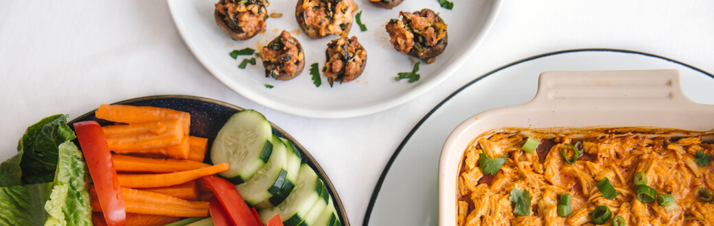 Stuffed mushrooms, buffalo chicken dip, and veggies.