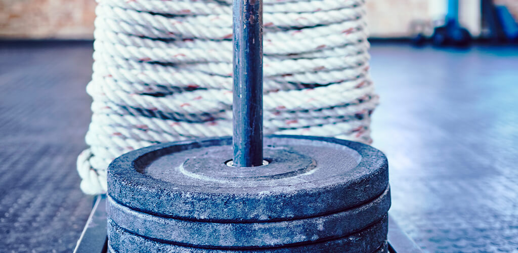 Weights on a gym sled