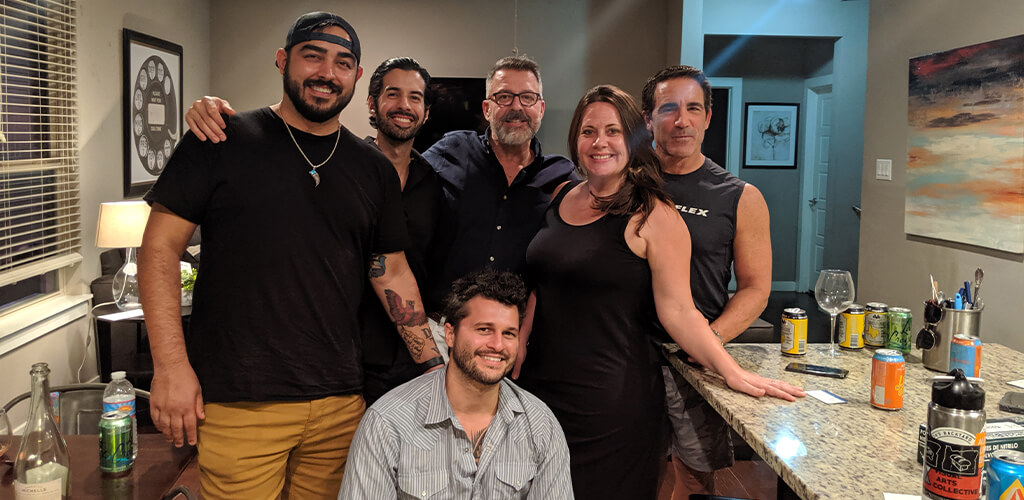 people looking happy in a kitchen