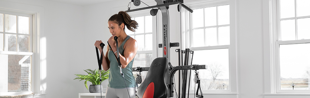 Woman doing a standing reverse curl